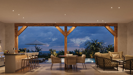 Photo of an outdoor patio at twilight lit by downlights.