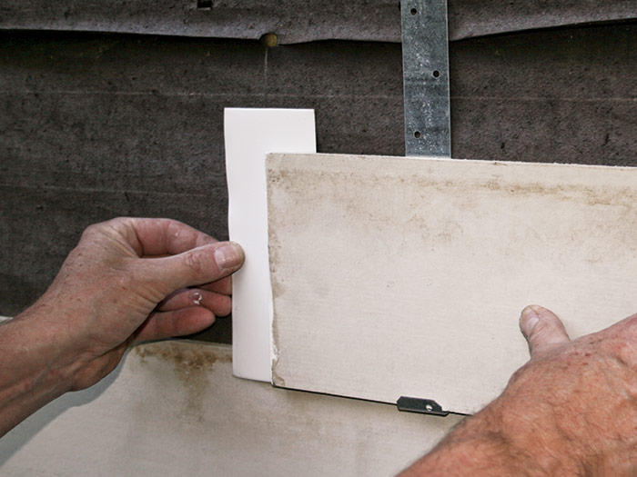 back up the joint with a piece of flashing