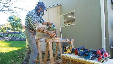 A man testing cordless planers